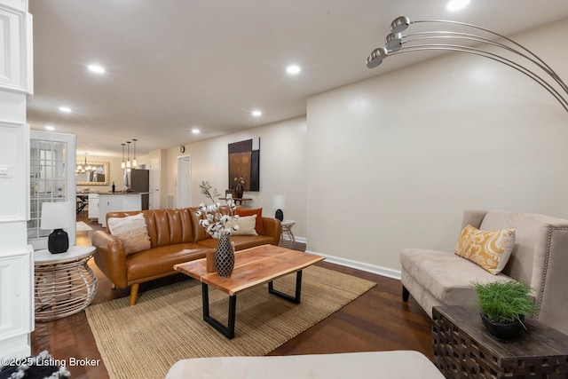 4316 Arwine Ct, Louisville, KY 40245 - living room featuring a chandelier, recessed lighting, baseboards, and wood finished floors