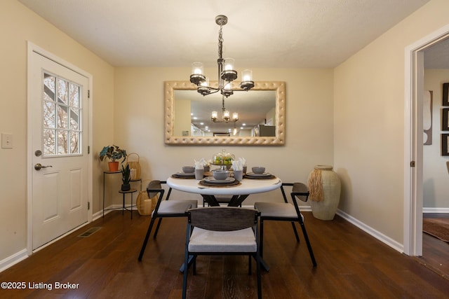 4316 Arwine Ct, Louisville, KY 40245 - dining room featuring visible vents, baseboards, an inviting chandelier, and wood finished floors