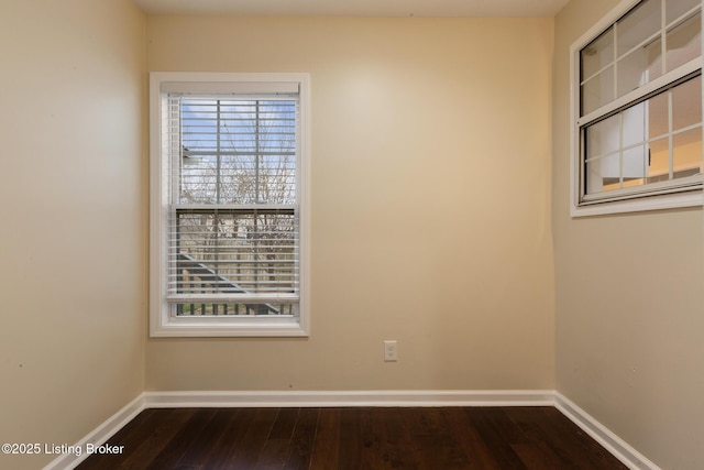 4316 Arwine Ct, Louisville, KY 40245 - spare room with baseboards and dark wood-type flooring
