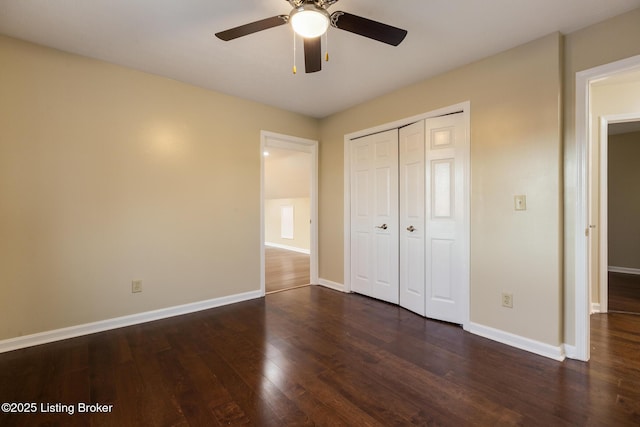 4316 Arwine Ct, Louisville, KY 40245 - unfurnished bedroom featuring dark wood-type flooring, baseboards, a closet, and ceiling fan