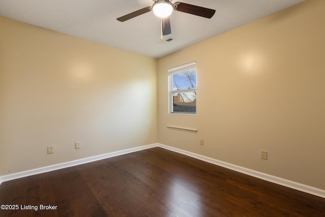 4316 Arwine Ct, Louisville, KY 40245 - spare room featuring visible vents, baseboards, dark wood-style floors, and a ceiling fan