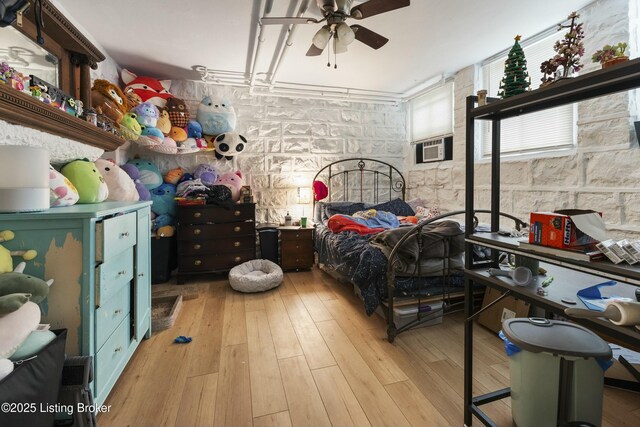 bedroom featuring light wood finished floors
