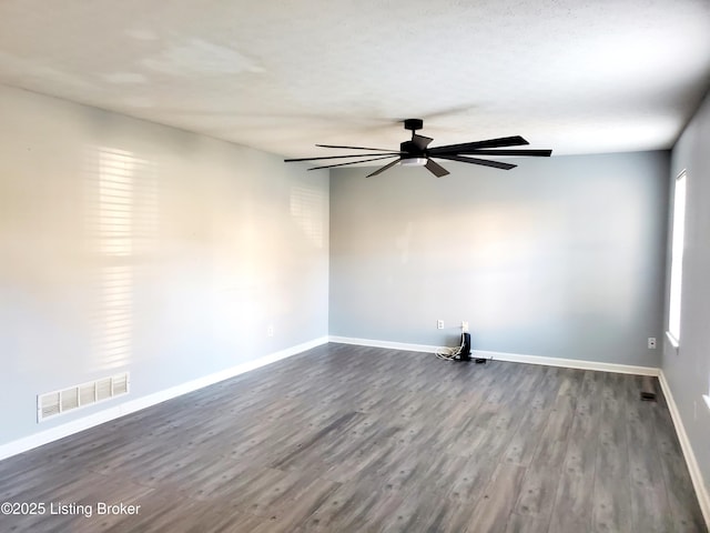 7808 Watering Pl, Louisville, KY 40291 - empty room featuring dark wood-type flooring, baseboards, visible vents, and ceiling fan