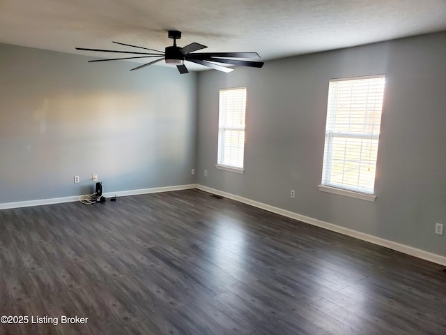 7808 Watering Pl, Louisville, KY 40291 - empty room with visible vents, baseboards, ceiling fan, and dark wood-style flooring