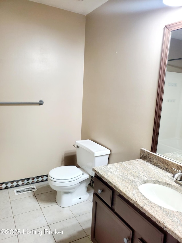 7808 Watering Pl, Louisville, KY 40291 - bathroom with vanity, toilet, visible vents, and tile patterned flooring