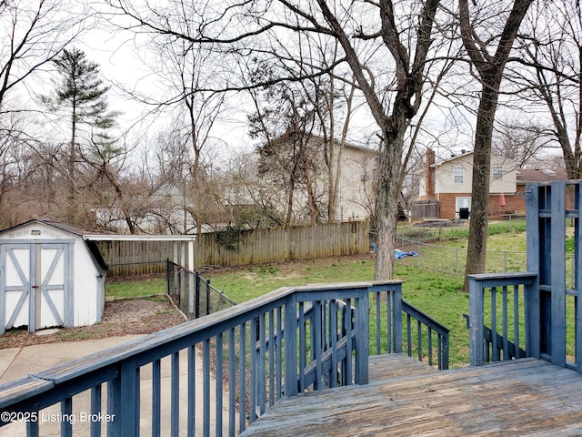 7808 Watering Pl, Louisville, KY 40291 - wooden deck featuring an outdoor structure, a yard, fence, and a shed