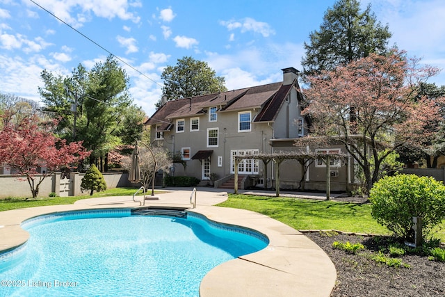 view of swimming pool with a fenced in pool, a patio, and fence