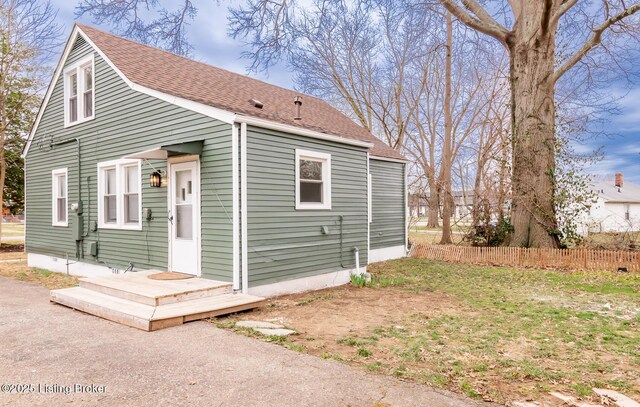 5512 Mae Ct, Louisville, KY 40214 - exterior space featuring fence and a shingled roof
