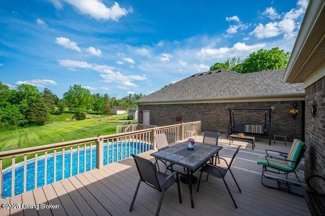 360 Rockcastle Villa, Shepherdsville, KY 40165 - deck featuring an outdoor pool, outdoor dining space, and a lawn