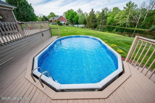 360 Rockcastle Villa, Shepherdsville, KY 40165 - swimming pool featuring a wooden deck and a lawn