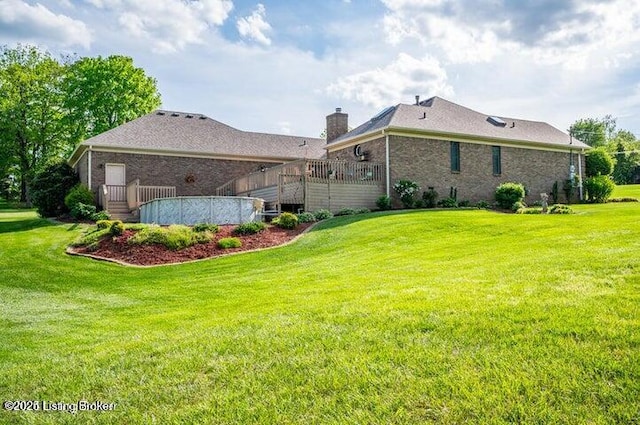 360 Rockcastle Villa, Shepherdsville, KY 40165 - rear view of house with a chimney, a yard, and brick siding