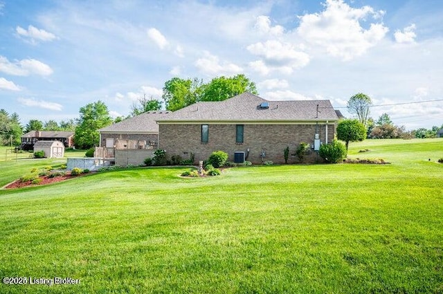 360 Rockcastle Villa, Shepherdsville, KY 40165 - rear view of house with a yard, central AC, and brick siding