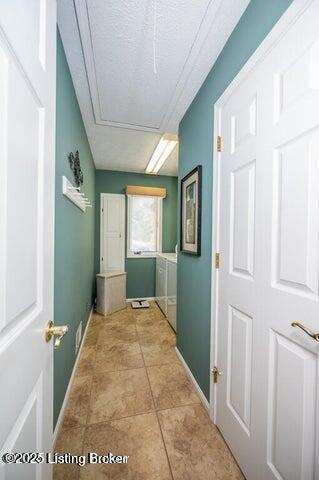 360 Rockcastle Villa, Shepherdsville, KY 40165 - hallway with attic access and baseboards