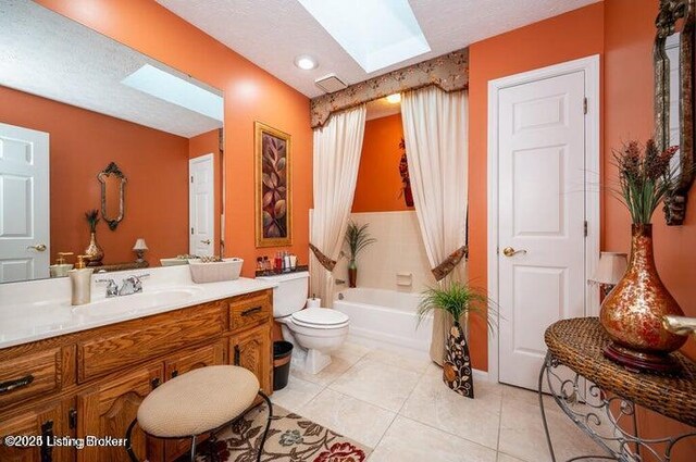 360 Rockcastle Villa, Shepherdsville, KY 40165 - full bath with a skylight, vanity, toilet, and tile patterned floors