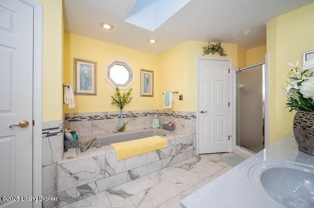 360 Rockcastle Villa, Shepherdsville, KY 40165 - full bath with a skylight, a garden tub, a stall shower, marble finish floors, and vanity