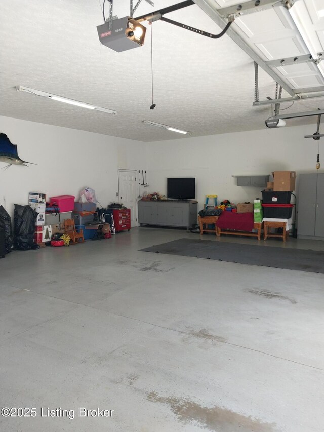 360 Rockcastle Villa, Shepherdsville, KY 40165 - garage featuring a garage door opener
