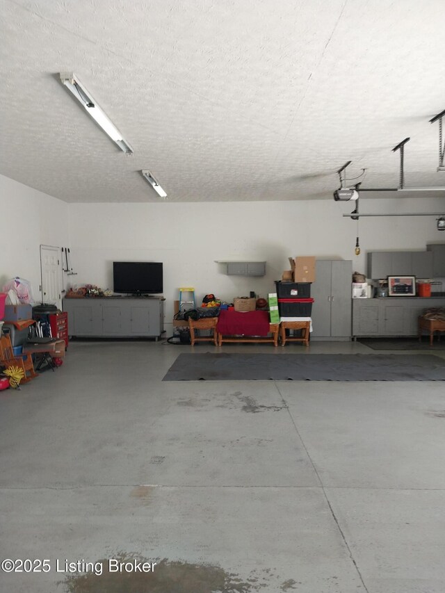 360 Rockcastle Villa, Shepherdsville, KY 40165 - garage with a garage door opener