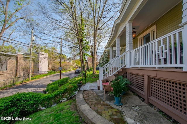 view of yard with a porch