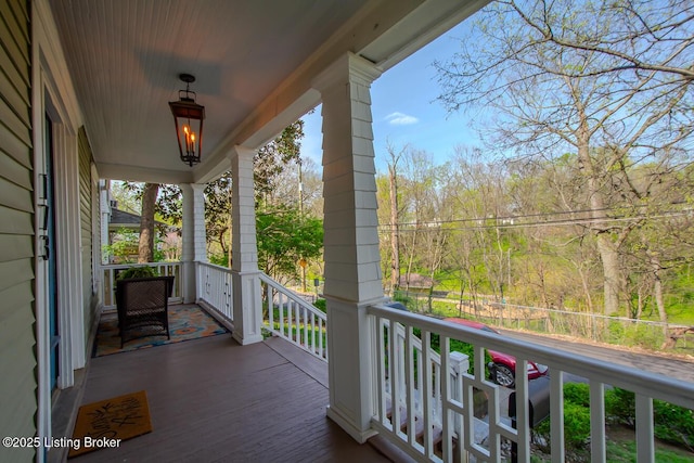 balcony featuring covered porch