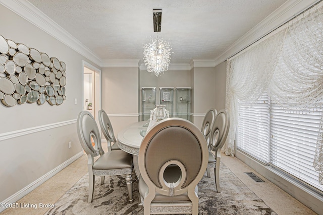 7603 Cottage Cove Way, Louisville, KY 40214 - dining space with baseboards, visible vents, an inviting chandelier, a textured ceiling, and crown molding