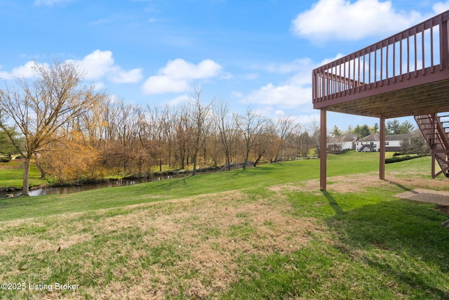 1501 Eagle Nest Way, Lyndon, KY 40222 - view of grassy yard featuring a deck and stairway