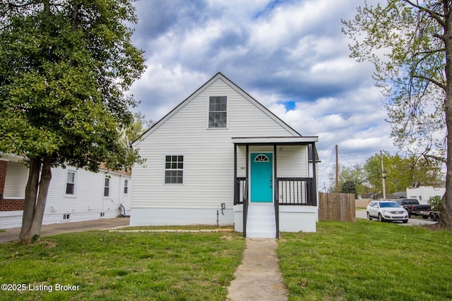 1301 Central Ave, Louisville, KY 40215 - bungalow-style house featuring a front yard and fence