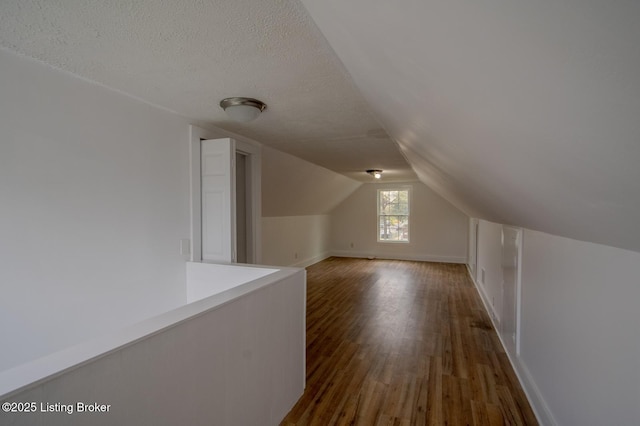 1301 Central Ave, Louisville, KY 40215 - bonus room featuring dark wood-type flooring, baseboards, and lofted ceiling