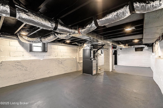 basement featuring heating unit