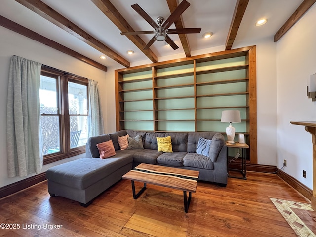living room with hardwood / wood-style flooring, a ceiling fan, beamed ceiling, baseboards, and recessed lighting