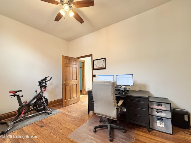 office with ceiling fan, light wood finished floors, and baseboards