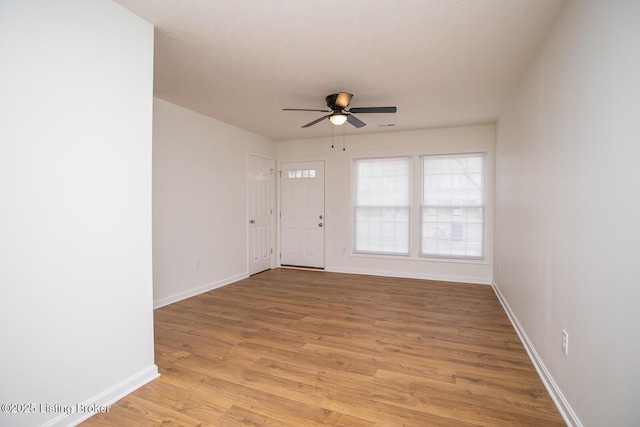 3833 Jupiter Rd, Louisville, KY 40218 - entrance foyer featuring a ceiling fan, light wood-style floors, and baseboards