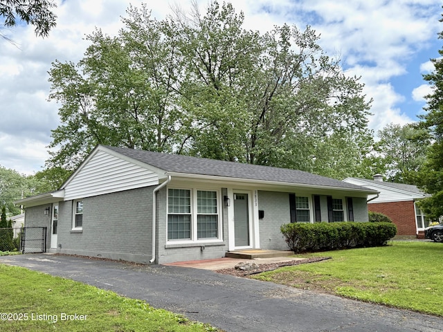 3833 Jupiter Rd, Louisville, KY 40218 - ranch-style home with brick siding and roof with shingles