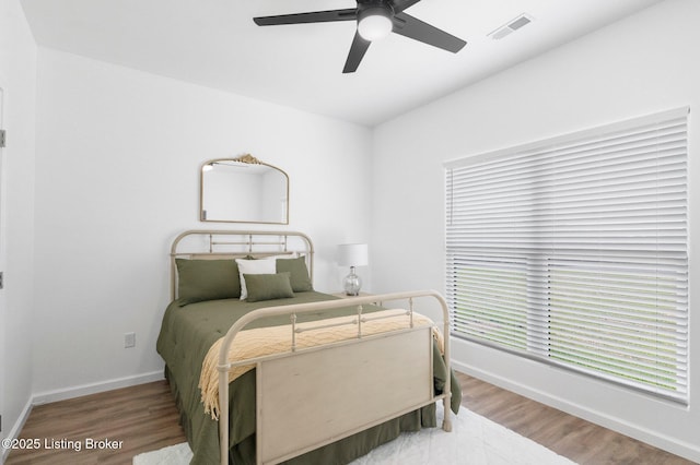 108 Sunny Ln, Sanders, KY 41083 - bedroom featuring a ceiling fan, wood finished floors, baseboards, and visible vents