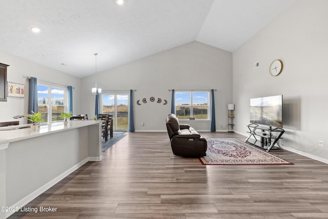 8806 Warbler Branch Way, Louisville, KY 40229 - living room with wood finished floors, visible vents, and baseboards