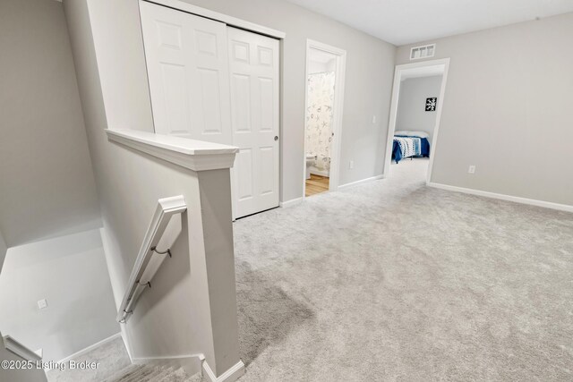 8806 Warbler Branch Way, Louisville, KY 40229 - interior space featuring carpet, visible vents, and baseboards