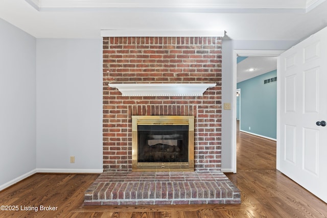 6709 Wild Fox Ln, Prospect, KY 40059 - unfurnished living room with a fireplace, wood finished floors, visible vents, and baseboards