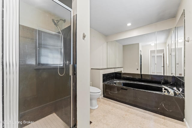 6709 Wild Fox Ln, Prospect, KY 40059 - full bathroom featuring recessed lighting, tile patterned flooring, a shower stall, toilet, and a garden tub