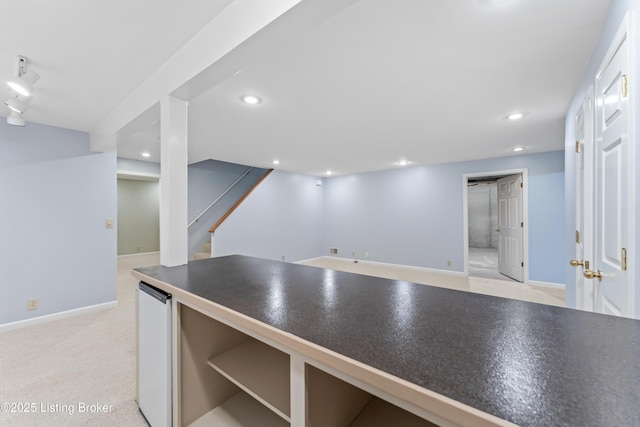 6709 Wild Fox Ln, Prospect, KY 40059 - kitchen featuring baseboards, recessed lighting, dark countertops, and light colored carpet