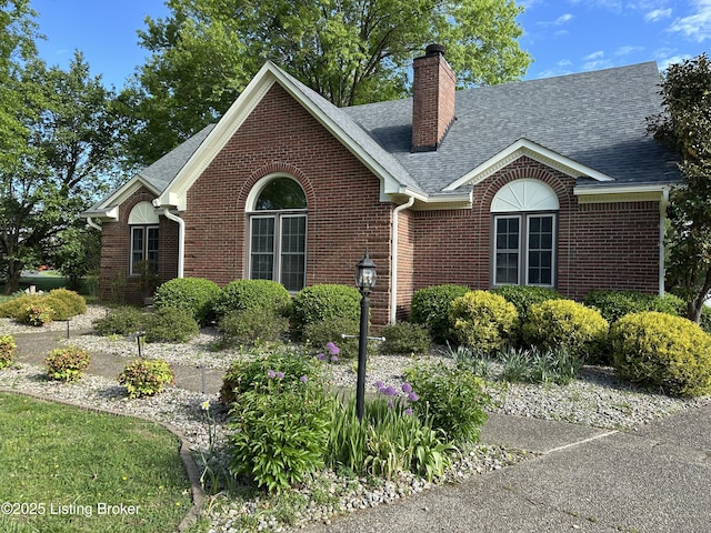 6709 Wild Fox Ln, Prospect, KY 40059 - ranch-style home with a chimney, brick siding, and a shingled roof