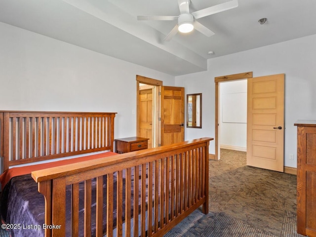 bedroom featuring baseboards and carpet flooring