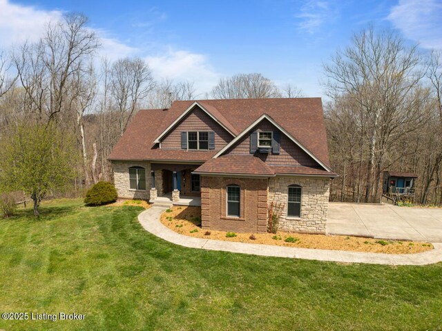 craftsman-style home featuring stone siding, a porch, and a front lawn