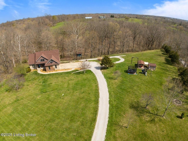 aerial view with a wooded view