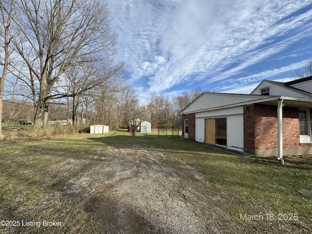 7725 3rd Street Rd, Louisville, KY 40214 - view of yard featuring a shed and an outdoor structure