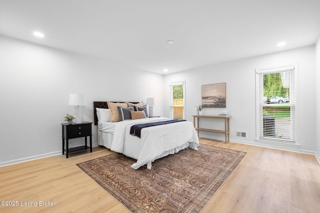 1911 Bainbridge Row Dr, Louisville, KY 40207 - bedroom featuring visible vents, multiple windows, and light wood-style flooring