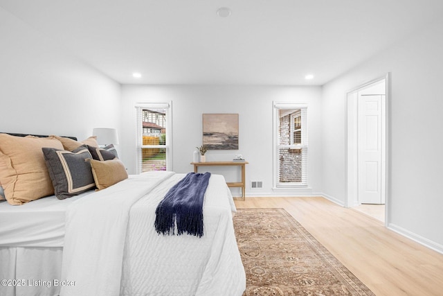 1911 Bainbridge Row Dr, Louisville, KY 40207 - bedroom featuring recessed lighting, wood finished floors, and baseboards