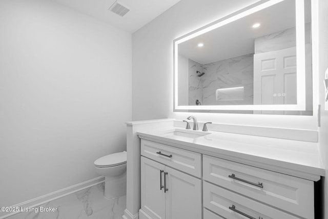1911 Bainbridge Row Dr, Louisville, KY 40207 - full bathroom featuring visible vents, baseboards, toilet, vanity, and marble finish floor