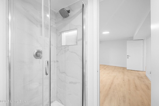 1911 Bainbridge Row Dr, Louisville, KY 40207 - bathroom featuring a stall shower, wood finished floors, and baseboards