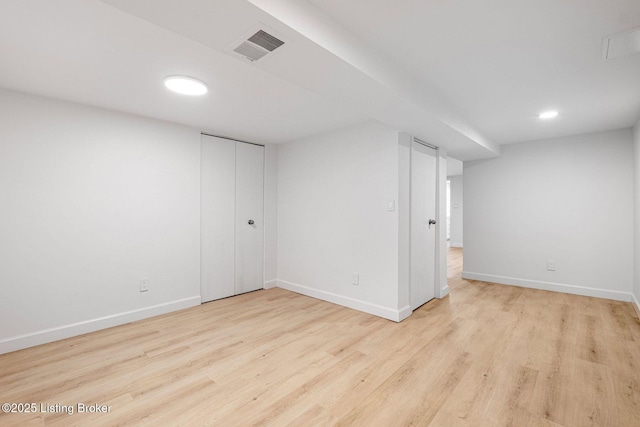 1911 Bainbridge Row Dr, Louisville, KY 40207 - finished basement featuring wood finished floors, recessed lighting, visible vents, and baseboards