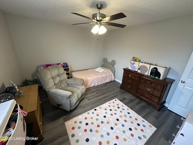 4177 Fairgrounds Rd, Brandenburg, KY 40108 - bedroom with baseboards, a ceiling fan, and wood finished floors