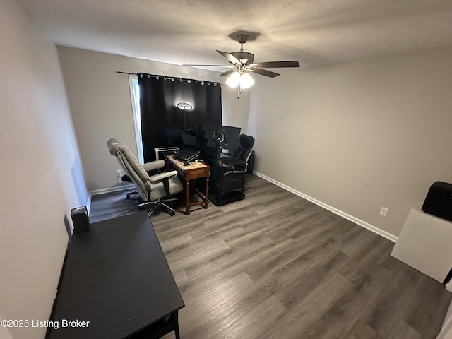 4177 Fairgrounds Rd, Brandenburg, KY 40108 - home office featuring baseboards, ceiling fan, and wood finished floors